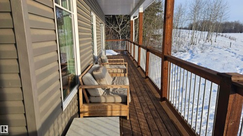 East, South and West  wraparound deck with amazing views. - 58513 Range Road 231, Rural Thorhild County, AB - Outdoor With Exterior