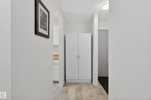 Coat Closet - 211 10838 108 Street, Edmonton, AB - Indoor Photo Showing Other Room