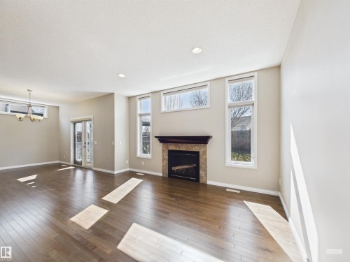 91 Copperhead Place, Stony Plain, AB - Indoor Photo Showing Living Room With Fireplace