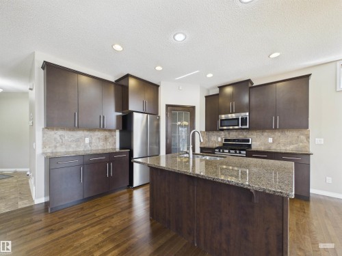 91 Copperhead Place, Stony Plain, AB - Indoor Photo Showing Kitchen With Upgraded Kitchen