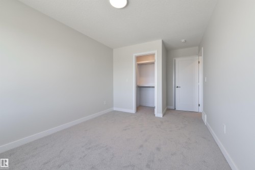 1443 Osprey Crest, Edmonton, AB - Indoor Photo Showing Other Room