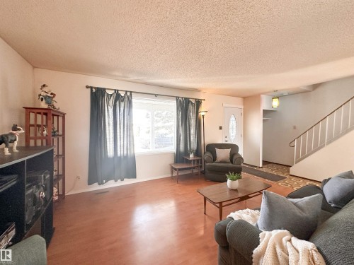 1 Forest Drive, St. Albert, AB - Indoor Photo Showing Living Room With Fireplace