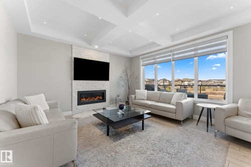 7640 179 Avenue, Edmonton, AB - Indoor Photo Showing Living Room With Fireplace