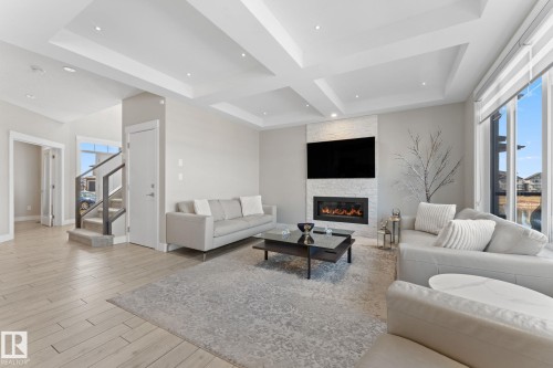 7640 179 Avenue, Edmonton, AB - Indoor Photo Showing Living Room With Fireplace