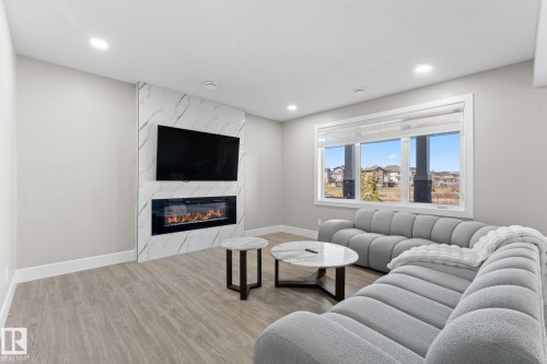 7640 179 Avenue, Edmonton, AB - Indoor Photo Showing Living Room With Fireplace