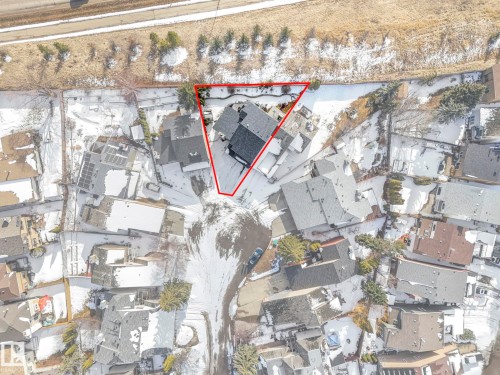 Property Boundary Survey. Outlining the perimeter of the property in relation to surrounding structures and land features - 12219 25 Avenue, Edmonton, AB -  With View