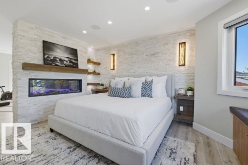 439 Rooney Crescent, Edmonton, AB - Indoor Photo Showing Bedroom With Fireplace