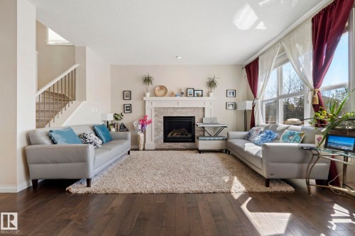 425 Simpkins Wynd, Leduc, AB - Indoor Photo Showing Living Room With Fireplace