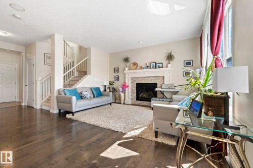425 Simpkins Wynd, Leduc, AB - Indoor Photo Showing Living Room With Fireplace