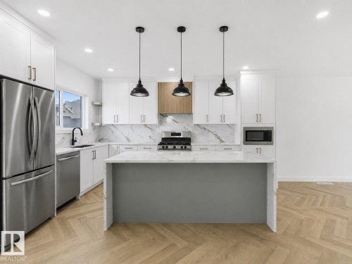 838 Northern Harrier Lane, Edmonton, AB - Indoor Photo Showing Kitchen With Stainless Steel Kitchen With Upgraded Kitchen