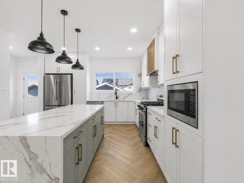 838 Northern Harrier Lane, Edmonton, AB - Indoor Photo Showing Kitchen With Upgraded Kitchen