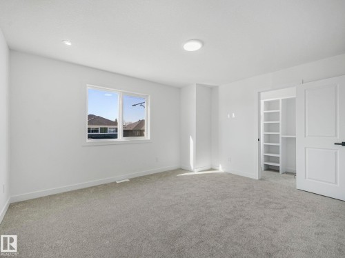 838 Northern Harrier Lane, Edmonton, AB - Indoor Photo Showing Other Room