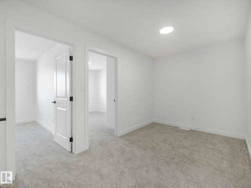 838 Northern Harrier Lane, Edmonton, AB - Indoor Photo Showing Other Room