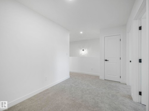 838 Northern Harrier Lane, Edmonton, AB - Indoor Photo Showing Other Room