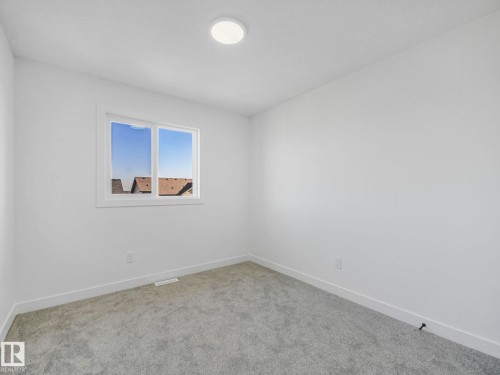 838 Northern Harrier Lane, Edmonton, AB - Indoor Photo Showing Other Room
