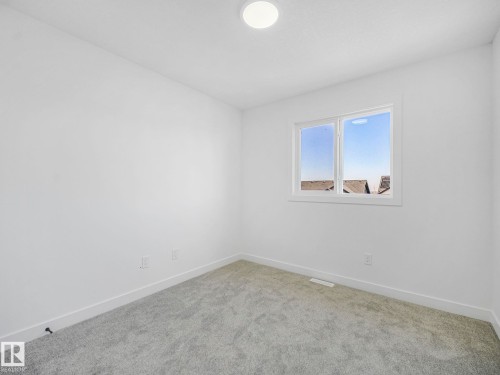 838 Northern Harrier Lane, Edmonton, AB - Indoor Photo Showing Other Room
