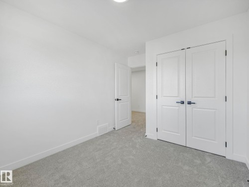 838 Northern Harrier Lane, Edmonton, AB - Indoor Photo Showing Other Room