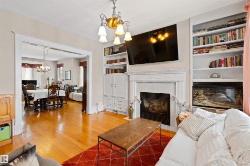 9819 92 Avenue, Edmonton, AB - Indoor Photo Showing Living Room With Fireplace