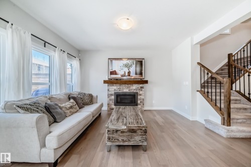 6479 Elston Loop, Edmonton, AB - Indoor Photo Showing Living Room With Fireplace
