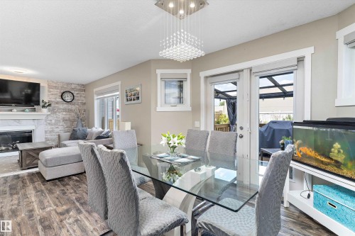 16532 140 Street, Edmonton, AB - Indoor Photo Showing Dining Room With Fireplace