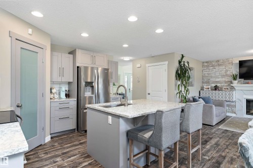 16532 140 Street, Edmonton, AB - Indoor Photo Showing Kitchen With Fireplace With Upgraded Kitchen