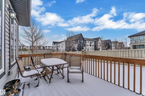Expansive wood-finish deck with a wood railing - 3702 Claxton Place, Edmonton, AB - Outdoor
