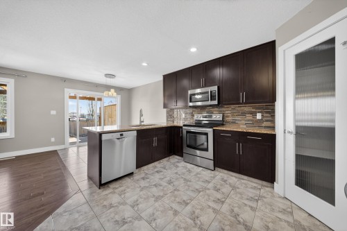 16717 60 Street, Edmonton, AB - Indoor Photo Showing Kitchen With Stainless Steel Kitchen With Upgraded Kitchen