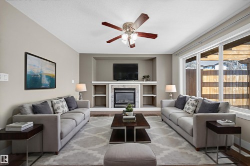 16717 60 Street, Edmonton, AB - Indoor Photo Showing Living Room With Fireplace