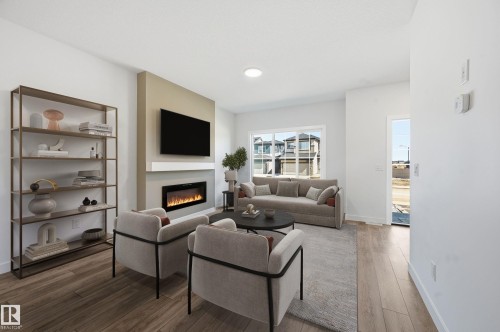 205 Wattle Road, Leduc, AB - Indoor Photo Showing Living Room With Fireplace