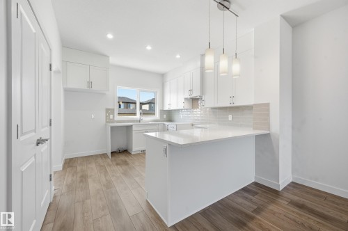 205 Wattle Road, Leduc, AB - Indoor Photo Showing Kitchen With Upgraded Kitchen