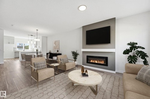 243 Wattle Road, Leduc, AB - Indoor Photo Showing Living Room With Fireplace