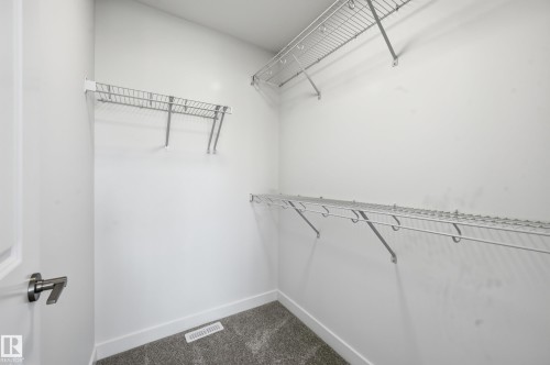 245 Wattle Road, Leduc, AB - Indoor With Storage