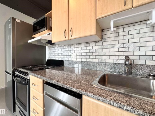 511 10024 Jasper Avenue, Edmonton, AB - Indoor Photo Showing Kitchen With Upgraded Kitchen