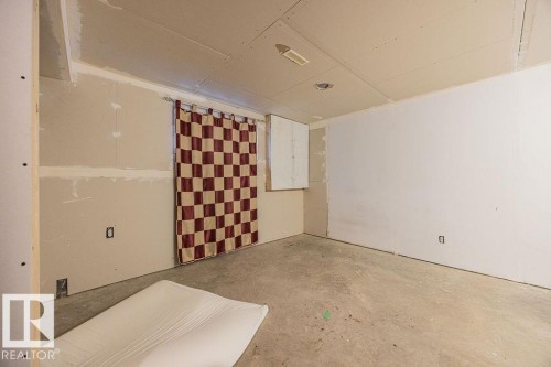 Unfinished interior space with drywall installation in progress - 14 9350 211 Street, Edmonton, AB - Indoor Photo Showing Other Room