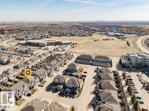 Aerial perspective showcasing a residential neighborhood with a variety of housing types - 14 9350 211 Street, Edmonton, AB - Outdoor With View