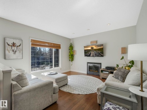 160 Carlson Close, Edmonton, AB - Indoor Photo Showing Living Room With Fireplace