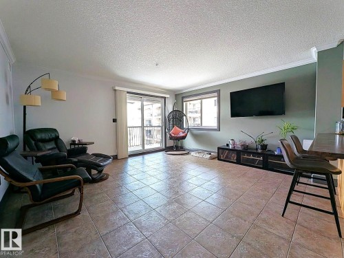 324 13111 140 Avenue, Edmonton, AB - Indoor Photo Showing Living Room