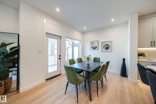 Dining area featuring light wood-finish flooring, recessed lighting, and white baseboards - 16 Blackbird Bend, Fort Saskatchewan, AB - Indoor Photo Showing Dining Room