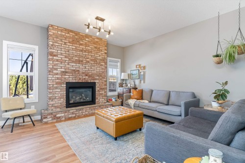 8355 Ellis Crescent, Edmonton, AB - Indoor Photo Showing Living Room With Fireplace