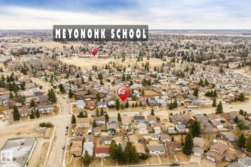Aerial neighborhood perspective showcasing residential properties and community infrastructure - 1566 Lakewood Road Nw, Edmonton, AB - Outdoor With View