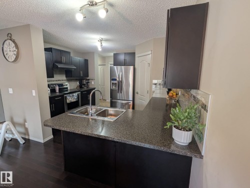3336 17B Avenue Nw, Edmonton, AB - Indoor Photo Showing Kitchen With Double Sink