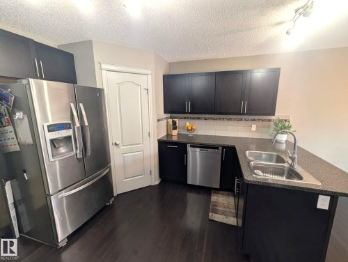 3336 17B Avenue Nw, Edmonton, AB - Indoor Photo Showing Kitchen With Double Sink