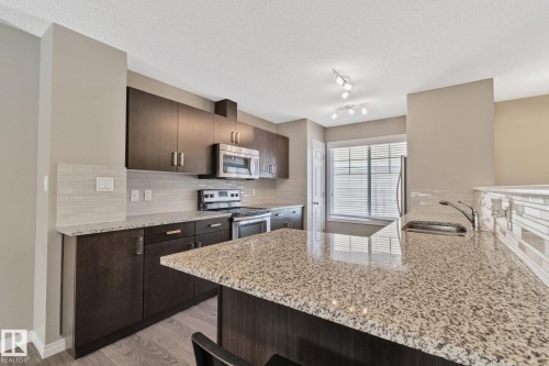 55 1030 Chappelle Boulevard, Edmonton, AB - Indoor Photo Showing Kitchen With Upgraded Kitchen
