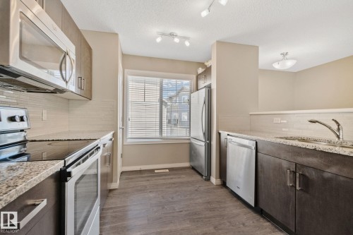 55 1030 Chappelle Boulevard, Edmonton, AB - Indoor Photo Showing Kitchen With Stainless Steel Kitchen With Upgraded Kitchen