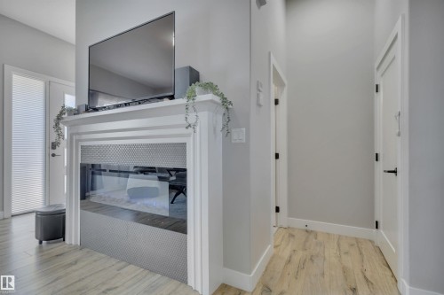 921 Berg Place, Leduc, AB - Indoor Photo Showing Other Room With Fireplace