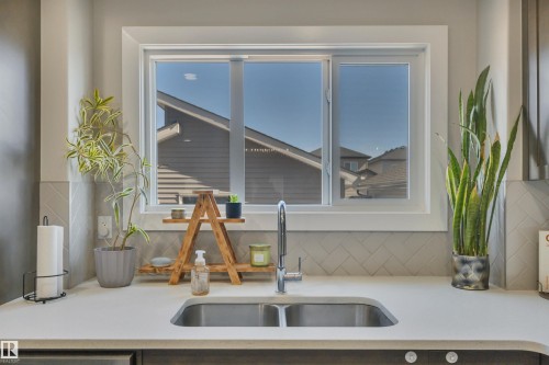 921 Berg Place, Leduc, AB - Indoor Photo Showing Kitchen With Double Sink