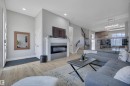 921 Berg Place, Leduc, AB  - Indoor Photo Showing Living Room With Fireplace 