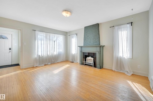 11608 91 Street, Edmonton, AB - Indoor Photo Showing Living Room With Fireplace