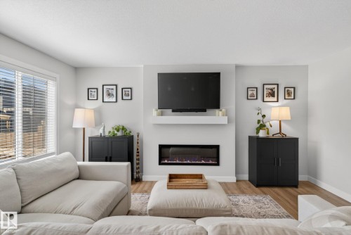 77 Penn Place, Spruce Grove, AB - Indoor Photo Showing Living Room With Fireplace