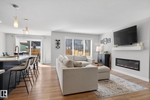 77 Penn Place, Spruce Grove, AB - Indoor Photo Showing Living Room With Fireplace